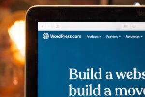 WordPress on a laptop which gives examples of content management system advantages.