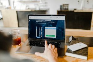 Planning e-commerce marketing strategies for a website on a laptop.