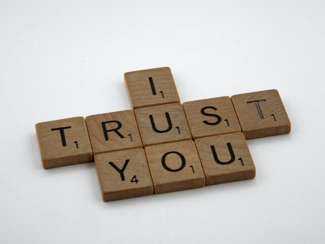 Scrabble letters spelling "I trust you" to denote credibility. Scrabble letters spelling "I trust you" to denote credibility.